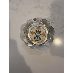Scalloped glass paperweight with Hand Cross-stitched Yellow And Orange Flowers